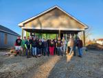 Wesco employee volunteers at one of 100 planned Habitat for Humanity in celebration of Wesco's 100th anniversary.